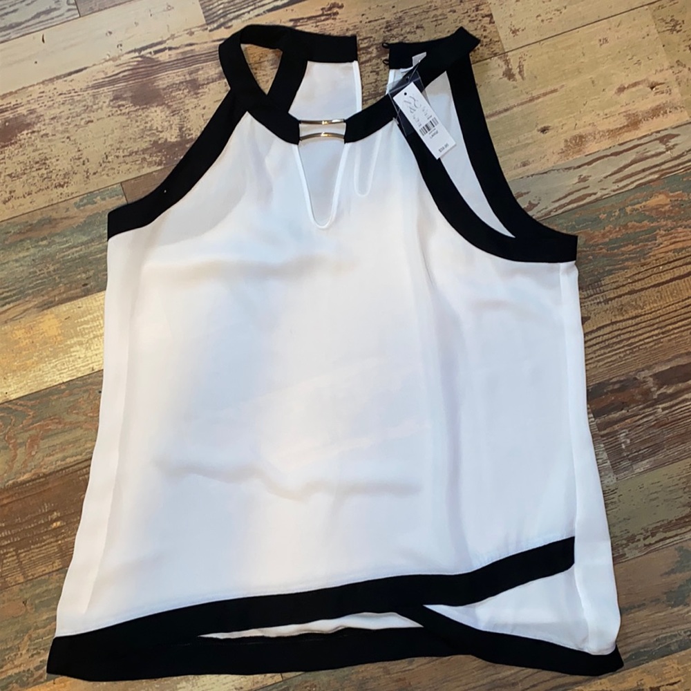 Fancy sleeveless white shirt with Black border